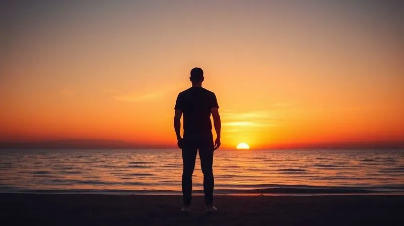 A lone figure, silhouetted against a breathtaking sunset over a calm ocean, standing on a quiet beach. The figure is looking out at the horizon, exuding a sense of peace and reflection. The scene is serene and expansive, emphasizing solitude and tranquility. Photorealistic, professional photography, 8K, cinematic lighting, sharp focus on the figure and sunset, depth of field blurring the distant horizon, shot on a high-end DSLR.